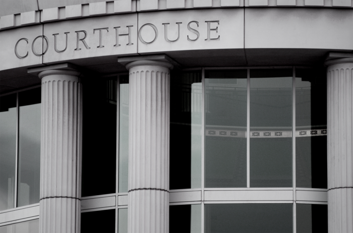 Image of a grey courthouse